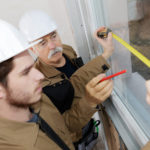 Men measuring windows rochester