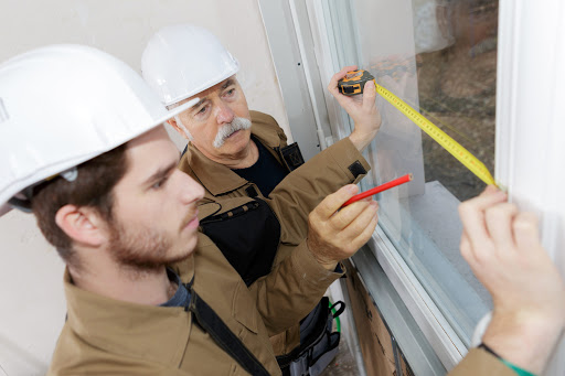 Men measuring windows rochester